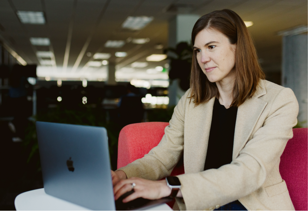 woman typing on laptop