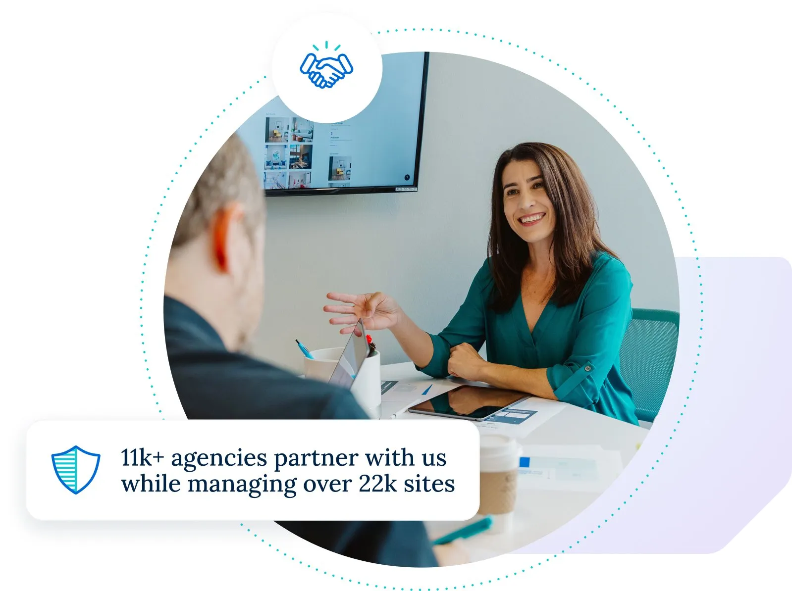 Woman happily presenting to a client. She is surrounded by a icon that represents partnership and a caption that reads 11k+ agencies partner with us while managing over 22k sites.